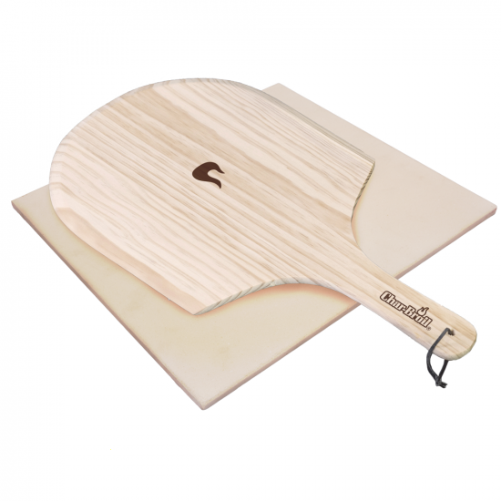 Equipo con piedra rectangular y pala de madera para pizza